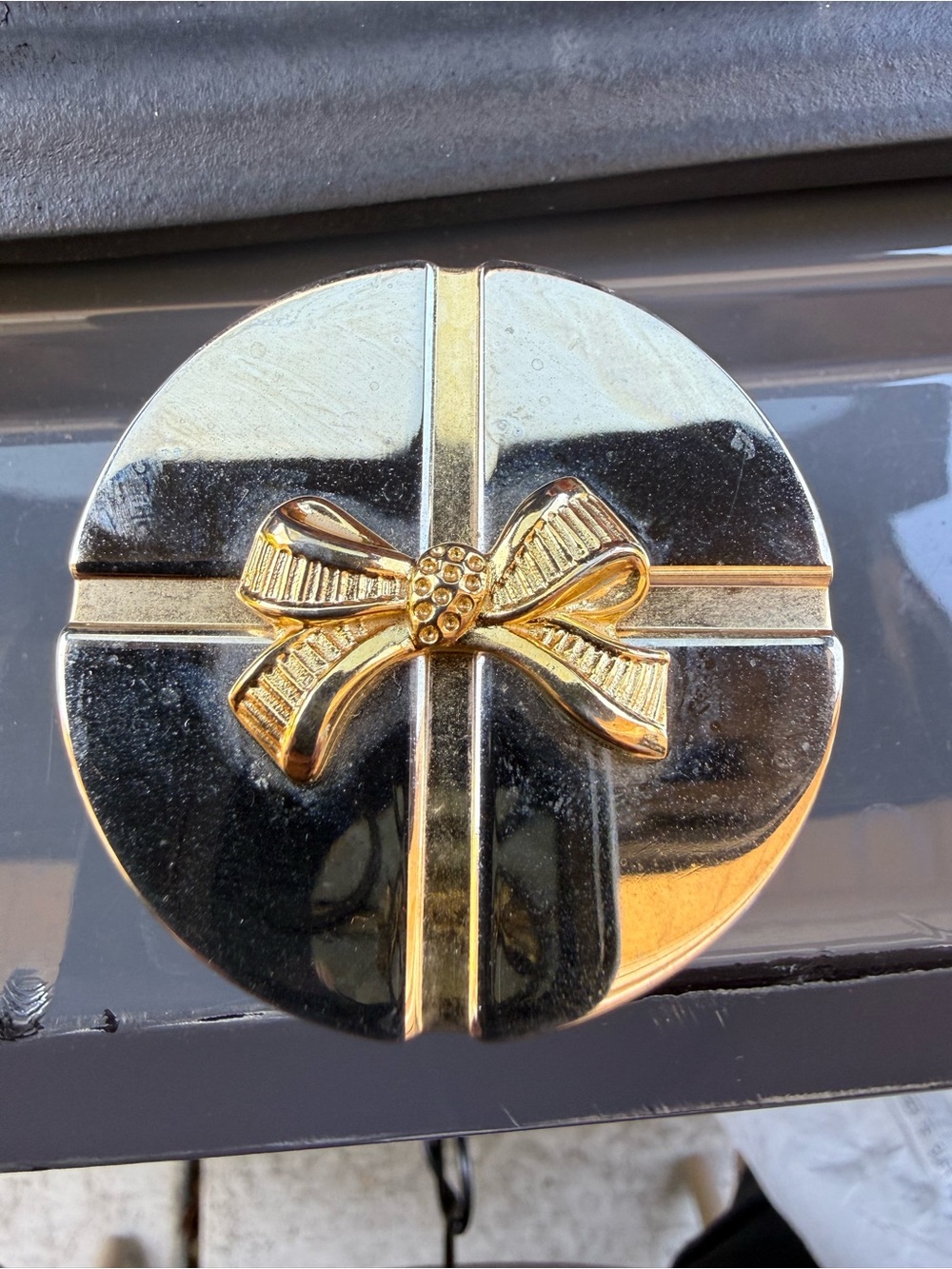 Miniature Elgin picture frame clock. Runs on watch battery.